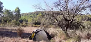 Low level wild camping in a small tent near Anna