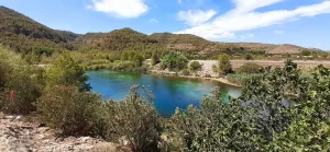 The stunning Júcar river landscape with mountains and trees