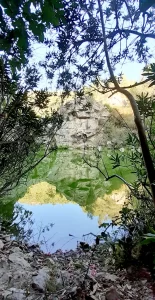 Reflections on the still water of the Gorg de Salt