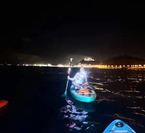 Paddleboarding at night with my reliable headtorch (and fairy lights!)